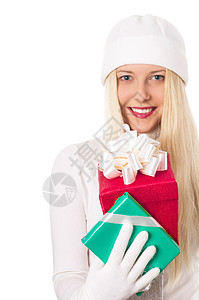 欢快的金发模特 圣诞节时带礼盒 女人和冬季礼物 用于购物销售和假日品牌图片