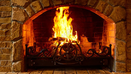 燃烧的壁炉 作为家具的壁炉 火花 假期 炉边图片