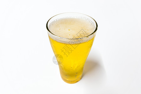 玻璃里有啤酒的白色金色泡泡 新鲜的 贮藏啤酒 棕色的 快乐的图片