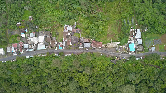 巴厘岛绿地貌 无人驾驶飞机对巴厘岛北部道路和树木的最高视线 旅游 天空图片