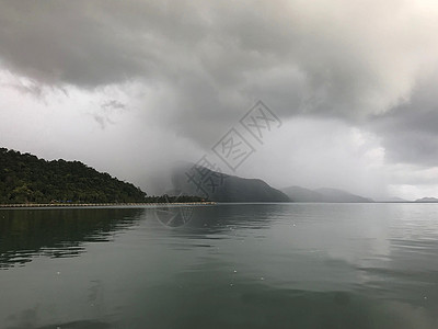 热带阵雨 房子 反射 云 黑暗的 邦宝湾 海 天 象岛图片
