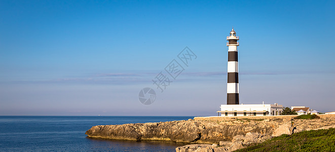 西班牙麦尔卡日落时的Artrux灯塔 海岸图片