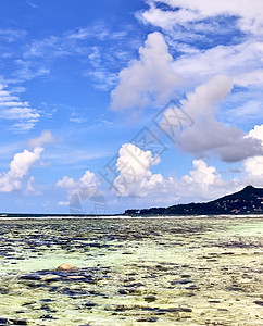 塞舌尔天堂岛屿上的日晒海滩观光景 天空 蓝色的图片