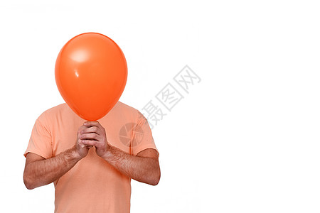 一个人头前顶着气球 这个气球就像个面具一样图片