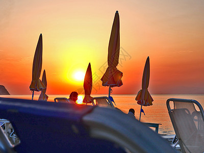 海滨的美丽日落 海岸 场景 希腊 水 伞 自然 假期图片