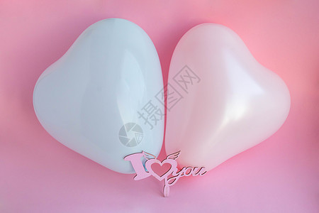 粉红色和蓝色的气球 心形 粉红色背景 上面写着我爱你 婚礼概念情人节照片区恋人 横幅 顶视图图片