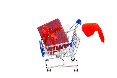 有礼物的推车在白色背景 新年和圣诞节 买礼物 在线购买 为假期做准备 礼物的选择图片