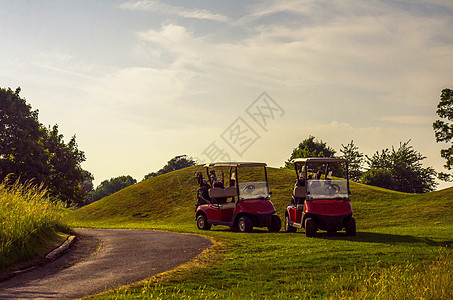 高尔夫球场的电动汽车 积极休闲 安静运动 娱乐 国家 车轮图片