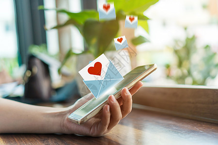 在智能手机社交网络在线社群上手打情书电子邮件 社会媒体的爱信寄出图标Valentine Valentine 庆典 婚姻图片