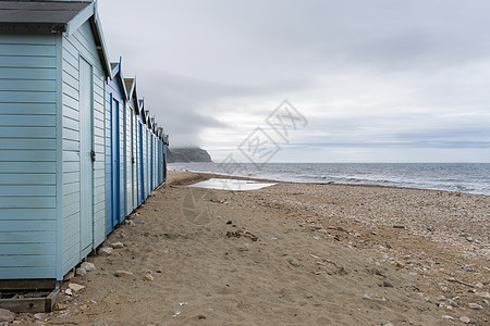 英国联合王国Dorset的海岸由英吉利海峡提供的蓝色沙滩度假屋 建筑学 门图片