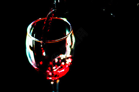 将红酒倒入玻璃杯中 用一杯葡萄酒庆祝片刻 为美食家提供精美的酒 品尝 晒黑图片