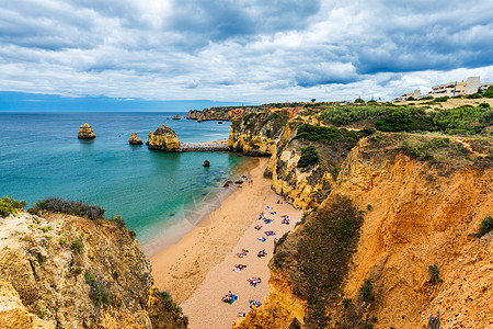 海滩与绿松石海水和悬崖 葡萄牙 美丽的多纳安娜海滩 在拉各斯 阿尔加维 葡萄牙 海景 岩石图片