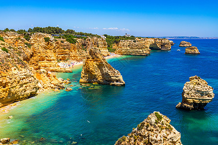 葡萄牙阿尔加维美丽的海滩 Marinha 海军海滩 是葡萄牙最著名的海滩之一 位于阿尔加维拉戈阿市的大西洋沿岸 洞穴 太阳背景图片