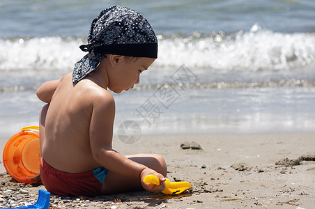 健康的生活方式 海滨男孩 孩子们 海滩 海浪 蓝色的图片