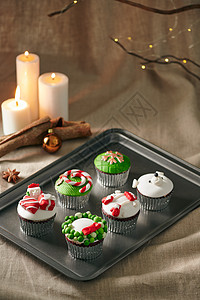 圣诞装饰纸杯蛋糕 美丽的节日背景 假期 甜点图片