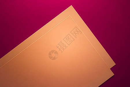 空白A4纸 粉红背景的棕褐色作为办公文文具平板 豪华品牌平铺牌和模型品牌设计 办公室 笔记图片
