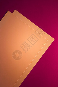 空白A4纸 粉红背景的棕褐色作为办公文文具平板 豪华品牌平铺牌和模型品牌设计 横幅 礼物图片