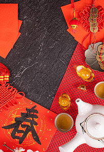 中国农历一月新年的设计理念-节日配饰 红包 红包 红包 顶视图 平躺 头顶上方 “春”字的意思是春天来了 茶 躺着图片