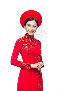 春节出行一位美丽的亚洲妇女穿着传统节服Ao Dai Tet节日 月经新年的肖像 化妆品 年轻的背景