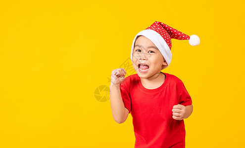 穿红色圣诞老人帽子的孩子 庆典 卡片 礼物图片