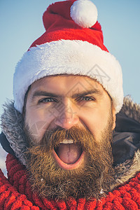 戴着红色帽子和围巾的圣诞老人时髦脸 脸上留着长胡子和小胡子的圣诞男人图片