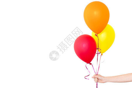 女性手将气球放在白色背景中 漂浮 快乐的 橙子 乐趣图片
