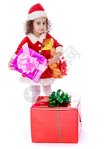 手里拿着礼物的女孩 人 圣诞节 可爱的 乐趣 假期 童年图片