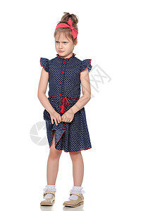 穿蓝裙子的害羞小女孩 童年 快乐 红色的 公主图片
