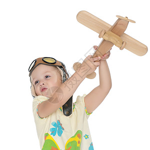 她手里拿着木制飞机的小女孩 未来 飞行员 乐趣图片