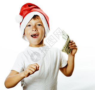 穿着圣塔红帽子的可爱小男孩 被美国货币拇指举起 年轻的 喜悦图片