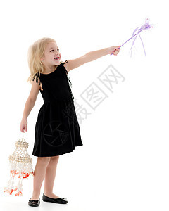 一个小女孩 带着魔杖 脸 戏服 衣服 圣诞节 假期图片
