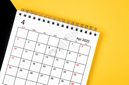 4月日历2022年4月 黄黑背景的案头日历背景