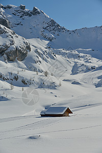 冬季山区山冬自然 阿尔卑斯山 阳光 寒冷的 云 霜 雪图片