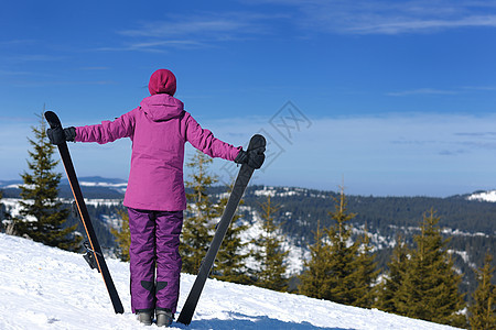 冬季妇女滑雪 行动 冬天 假期 快乐的 滑雪者 乐趣 衣服图片