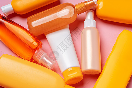日光皮肤护理产品瓶子种类多样的背景背景图片