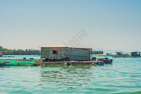 越南水上渔夫的屋 桥 岛 海 建造 河图片