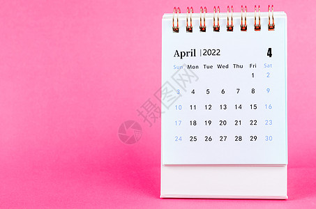 4月日历2022年4月 关于粉红色背景的案头日历背景
