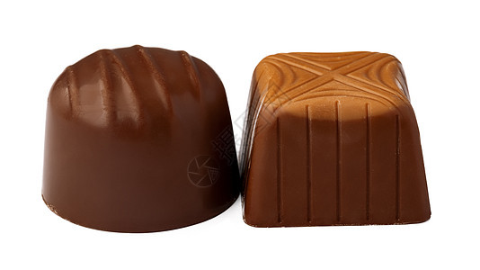 白色背景的巧克力糖果甜食孤立于白底 果仁糖 球图片