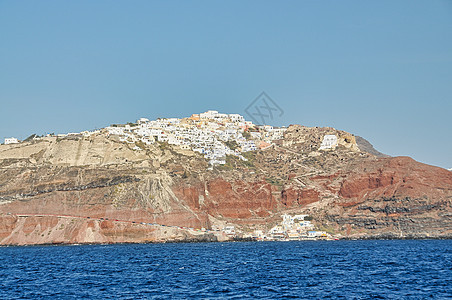 希腊圣托里尼岛的Oia镇 希腊 传统和著名的房屋和教堂 在爱琴海卡尔德拉海沿岸有蓝丘陵 海滩 海岸图片