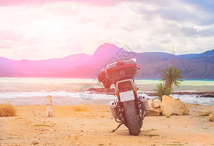 沙滩上的摩托车 男朋友 海浪 户外 自行车 旅行 运输图片