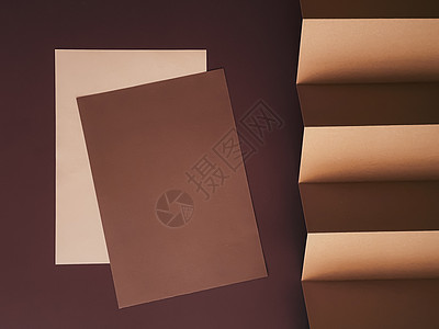 米色和棕色 A4 纸作为办公文具平铺 奢侈品牌平铺和品牌标识设计 用于模型 工作和创意 平躺 商业图片