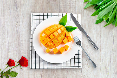切开的芒果美食背景设计图片