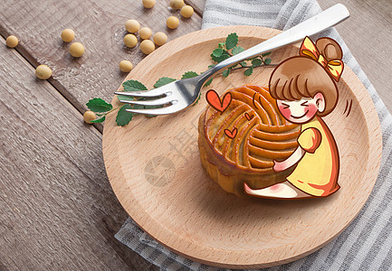 中秋传统美食月饼摆拍木板背景图片