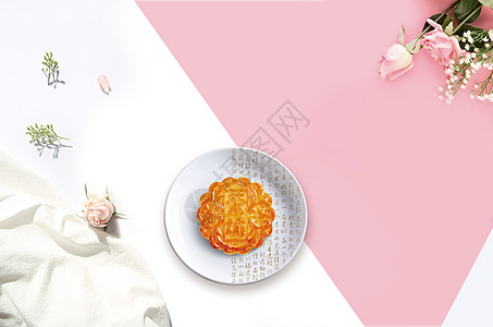 粉色盘子中秋月饼简洁场景图设计图片