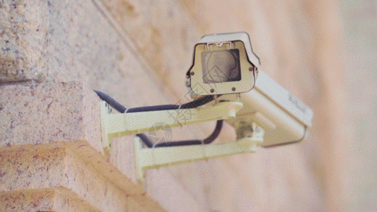 大理石墙上的监控摄像头GIF图片