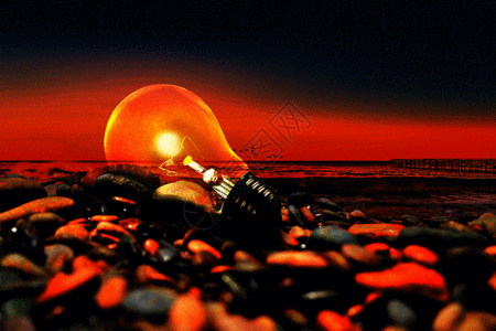电子厂房海边石头堆上发光的灯泡gif动图高清图片