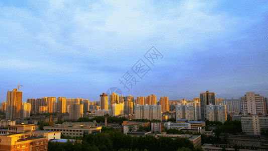 蓝天白云高楼城市延时GIF高清图片