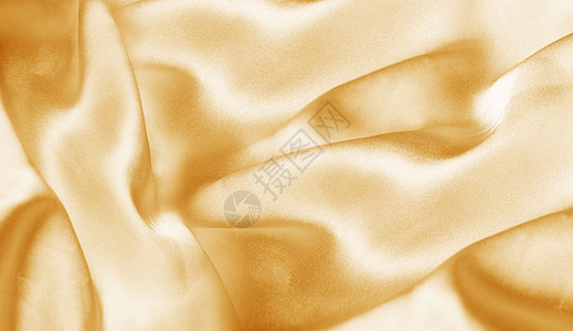 黄冰糖金色丝绸背景设计图片