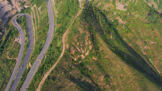 蜿蜒的山路盘山公路航拍GIF高清图片