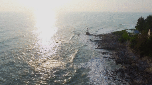 海边灯塔黑白海岸线灯塔航拍GIF高清图片